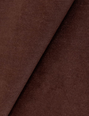 Close up view of the Gladys extended headboard upholstered platform bed in wine corduroy