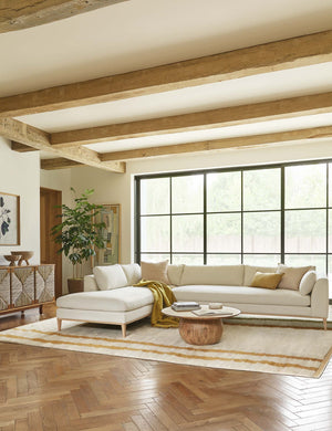  custom alt text - an ivory couch in front of a window