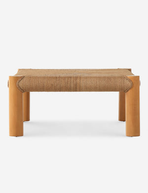 Side view of the Lerner mahogany wood woven top coffee table.