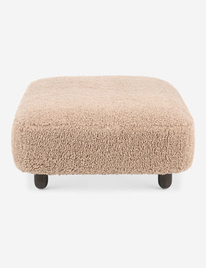 Side view of the Dover faux shearline long ottoman.