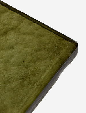 Close up of the corner of the Bergen retro iron frame and glass top side table.