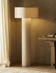 #color::natural | Solstice monochromatic linen column floor lamp styled next to a console table.