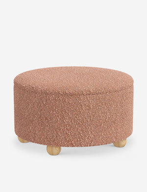 Angled view of the Kamila Blush Boucle 34-inch ottoman
