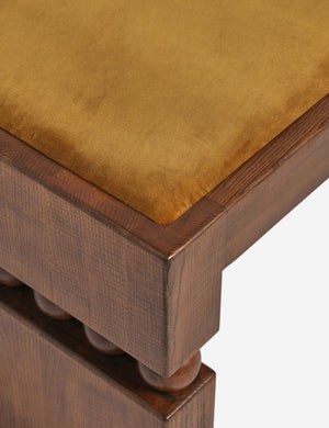 Close up of the upholstered seat of the Ceiba mixed-material sculptural accent bench by Carly Cushnie.