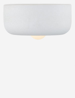 Denny textured ceramic flush mount light.