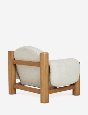 Angled rear view of the James faux sherpa accent chair