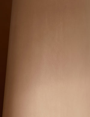 Close up of the base of the Keating sculptural round fiberstone outdoor dining table.