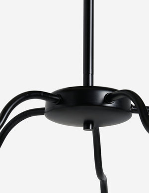 Close up view of the Kukka large modern wavy arm chandelier in bronze