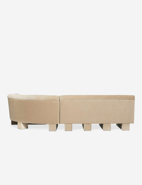 #color::brie-classic-Velvet #configuration::right-facing #size::114-W | Rear view of the entire Lena left-facing beige velvet sectional sofa with upholstered beam legs.