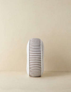 Side profile of the Littu Indoor / Outdoor Striped Disc Pillow by Sarah Sherman Samuel in Brown