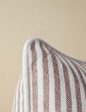 Close up of the corner of the Littu Indoor / Outdoor Striped Throw Pillow by Sarah Sherman