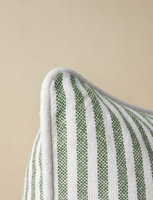 Close up of the corner of the Littu Indoor / Outdoor Striped Throw Pillow by Sarah Sherman