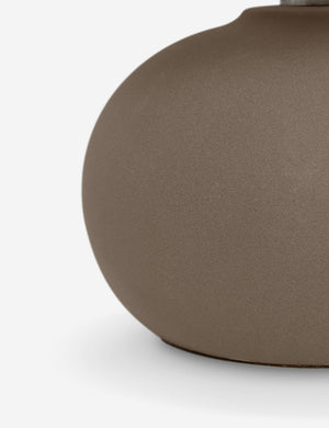 Close up of the Luis round ceramic mini table lamp.