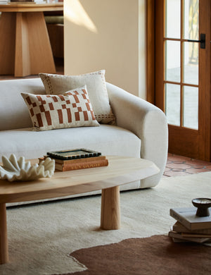 Mosaic Linen Lumbar Pillow by Elan Byrd styled on a sofa.