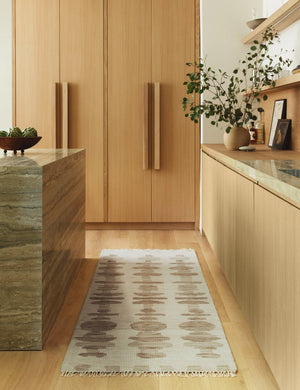 Yana hand-knotted organic pattern wool runner rug styled in a kitchen.