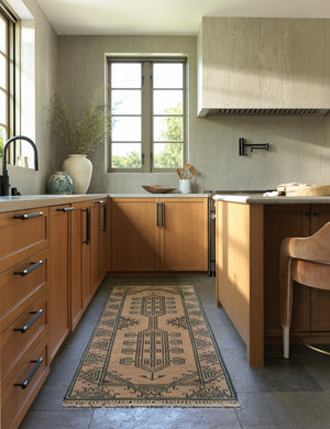 The Vishal geometric motif hand-knotted wool runner rug styled in a kitchen.
