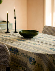 #color::azure #size::large #size::small | Dining table styled with the Golden floral stripe linen tablecloth by Heidi Caillier