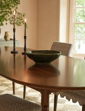 Peony green textural terracotta decorative bowl by Heidi Caillier styled on a dining table.