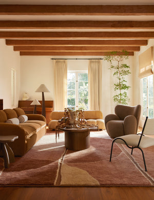 Living room featuring the Torino sculptural dark brown nesting coffee table by Aimee Song