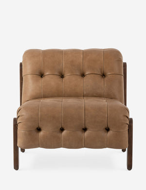 Cantor button-tufted armless leather accent chair.