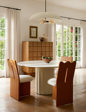Brolly matte white, 3-bulb dome pendant light hanging over a round dining room table