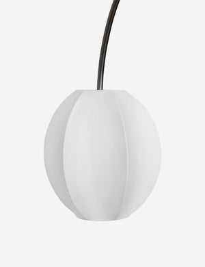 Close up of the Luneth arc-shape lantern shade linear chandelier by Aimee Song