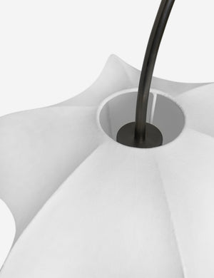 Close up of the Luneth arc-shape lantern shade linear chandelier by Aimee Song