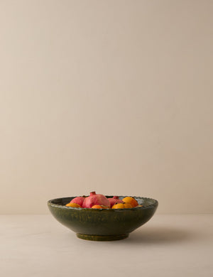 Peony green textural terracotta decorative bowl by Heidi Caillier filled with skin on fruit.