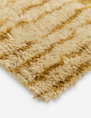 Close up of the corner of the Bhari thick organic design hand-knotted wool rug.