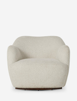 Selkie modern barrel swivel chair in ivory boucle.