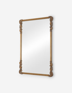 Angled view of the Charlo ornate scroll frame wall mirror