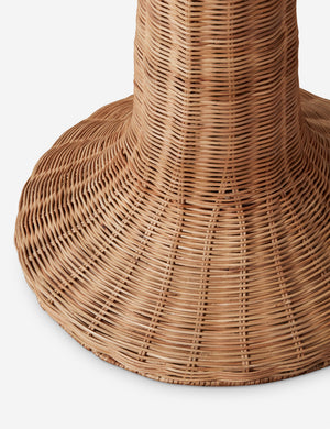Close up of the base of the Quinley rattan coastal floor lamp.