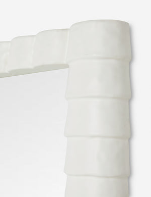 Top corner of the Munro white sculptural modern floor mirror.