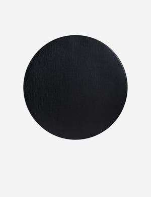 Overhead view of Olga round modern black oak coffee table