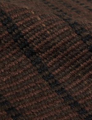 Close up of the Shere handwoven striped outdoor rug by Sarah Sherman Samuel in Brown