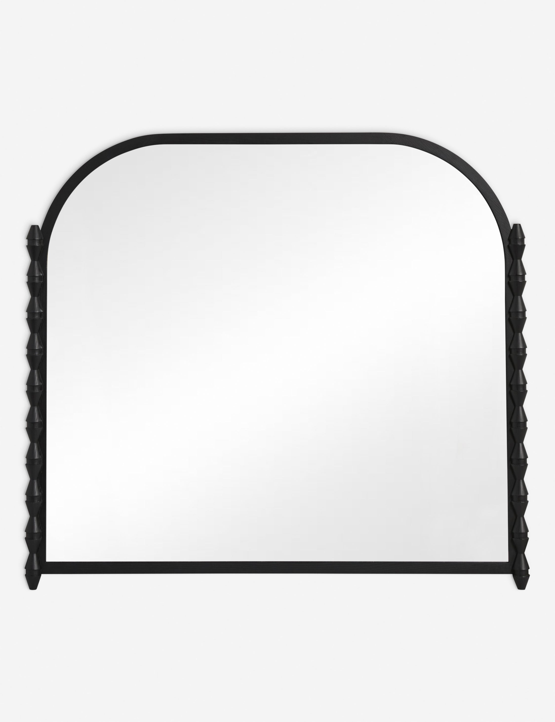 #color::black | Topia arched carved wood mantel mirror by Ginny Macdonald in black.