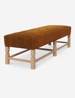 Ambleside Cognac velvet upholstered bench with carved detailing on the frame and vertical channeling around the cushion by Ginny Macdonald