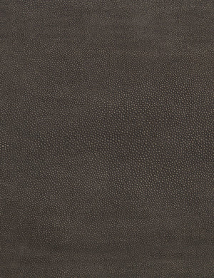 The oiled-bronze frame on the Eryn coffee table