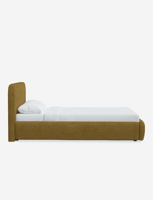 Side of the Nabiha ochre boucle platform bed