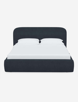 Nabiha upholstered Navy Linen platform bed with a rounded headboard