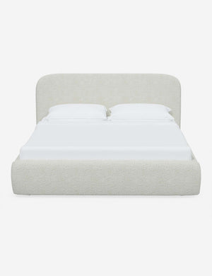 Nabiha upholstered White Boucle platform bed with a rounded headboard