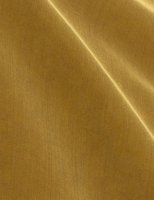 The Citronella Velvet fabric on the Nabiha platform bed