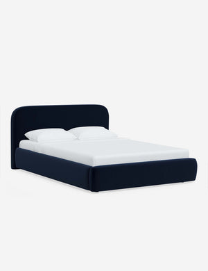 Angled view of the Nabiha Navy Velvet platform bed