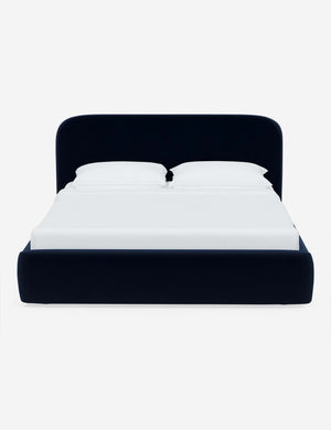 Nabiha upholstered Navy Velvet platform bed with a rounded headboard