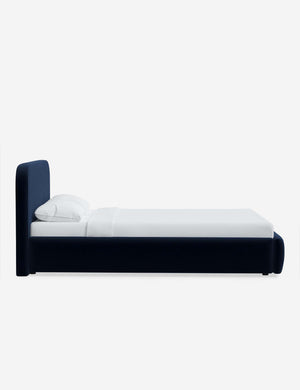 Side of the Nabiha Navy Velvet platform bed