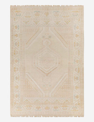 Lotus hand-knotted natural-toned rug with a floral border and geometric detailing in a traditional medallion design