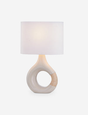 Dano round sculptural mixed-material table lamp.