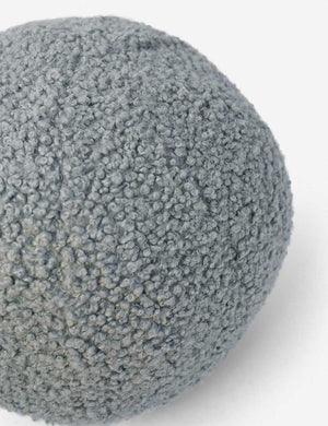 Angled view of the Canyon blue Bouclé Ball Pillow by Sarah Sherman Samuel