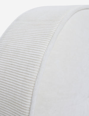 Close up of the piped edges and ribbed siding on the Velvet Disc ivory pillow by Sarah Sherman Samuel