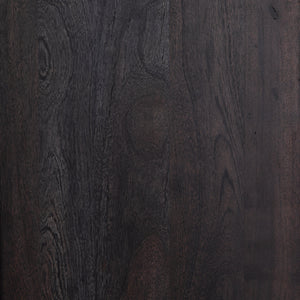 Detailed view of the black mango wood on the Hannah black mango wood cabinet with cane doors